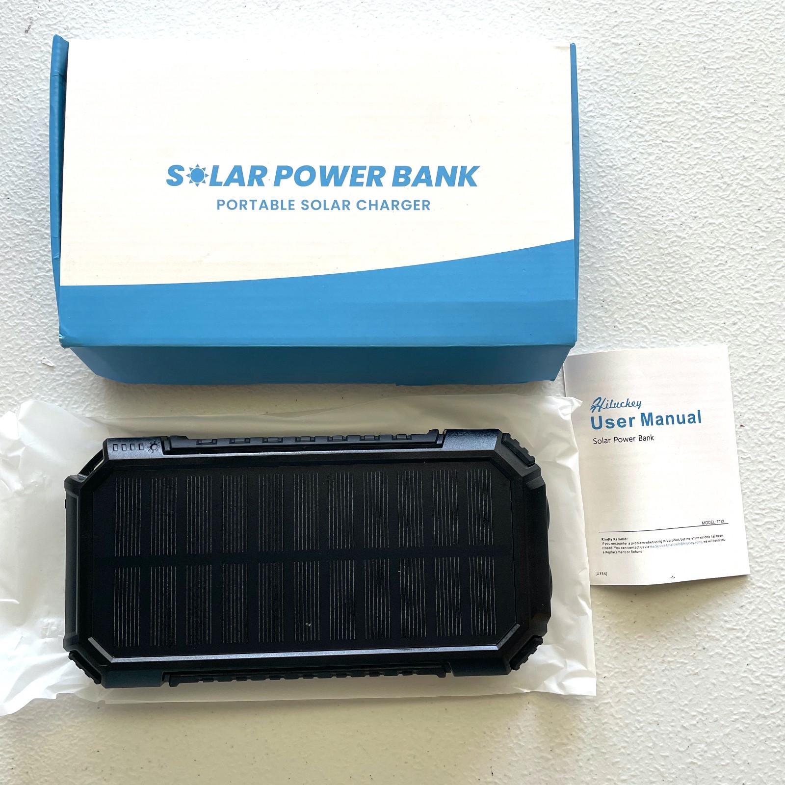Solar Power Bank with Built-in Charging Cables and Flashlight 3.7V 27000mAh NIB